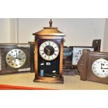 FOUR 20TH CENTURY WALL CLOCKS, comprising a Seiko quartz oak cased wall clock, with pendulum, height