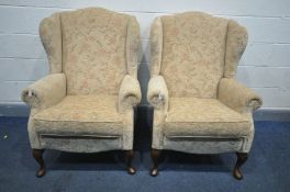 A PAIR OF SHERBOURNE FLORAL UPHOLSTERED WING BACK ARMCHAIRS on cabriole front legs