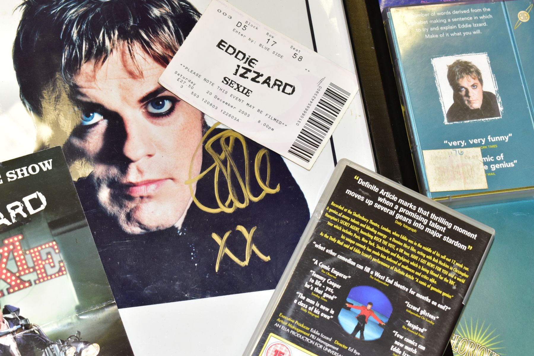 A BOX AND LOOSE EDDIE IZZARD ITEMS, comprising a framed limited edition signed photograph numbered - Image 2 of 2