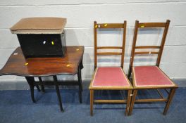 AN EDWARDIAN MAHOGANY SUTHERLAND TABLE, along with a pair of Edwardian chairs and a storage stool (