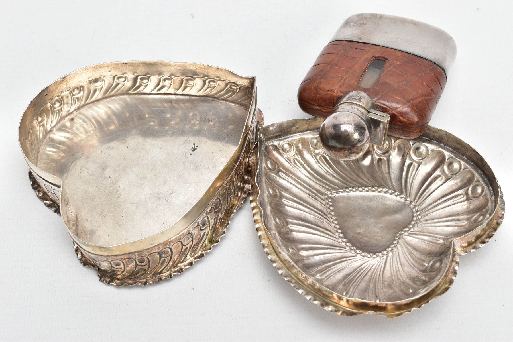 A SILVER TRINKET AND A HIPFLASK, a late Victorian embossed heart shaped trinket, with a vacant heart - Image 4 of 5