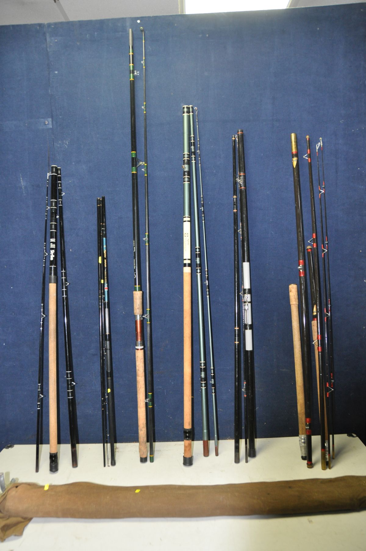 A COLLECTION OF FISHING RODS to include Olympic tubular model No 1303L, Shakespear strike, Bookers