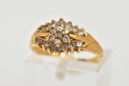 A 22CT GOLD CUBIC ZIRCONIA DRESS RING, set with a flower cluster of colourless cubic zirconia