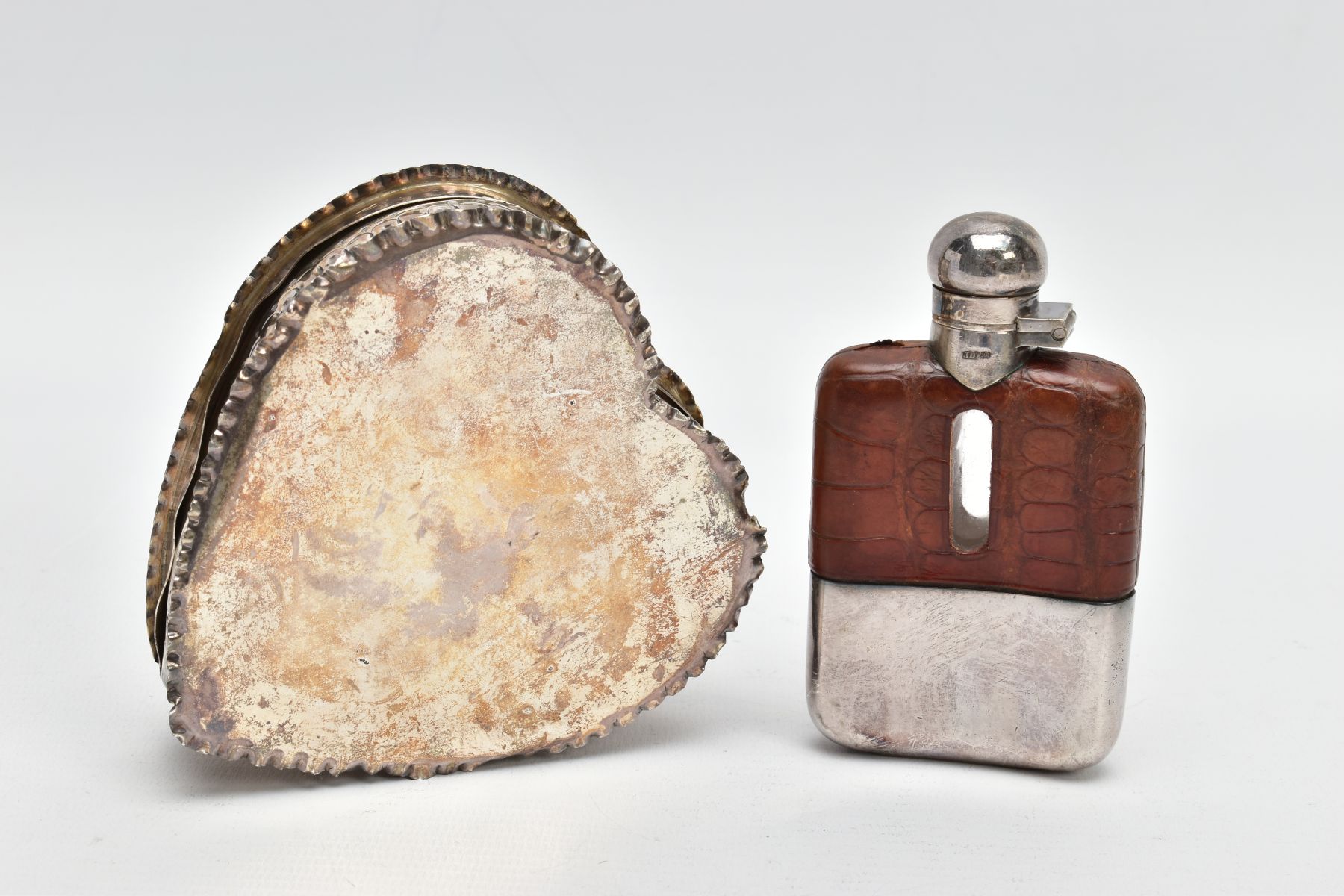 A SILVER TRINKET AND A HIPFLASK, a late Victorian embossed heart shaped trinket, with a vacant heart - Image 2 of 5
