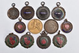 AN ASSORTMENT OF MEDALS, to include seven cycling medals, three running medals and two tricycle