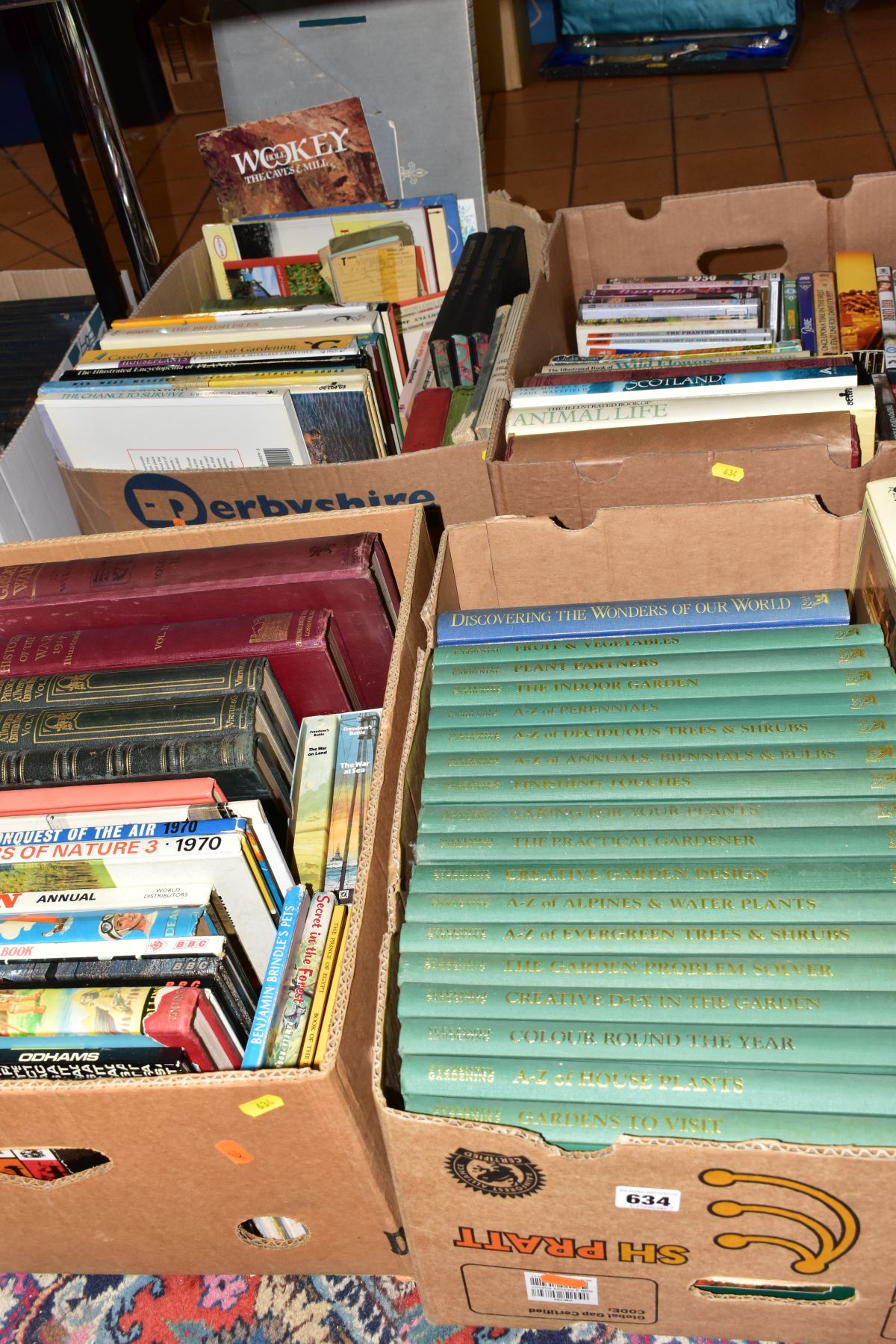 FOUR BOXES OF BOOKS AND DVDS, approximately seventy books with titles to include gardening,