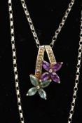 A 9CT WHITE GOLD, GEM SET PENDANT NECKLACE, the pendant in the form of two flower drops one set with