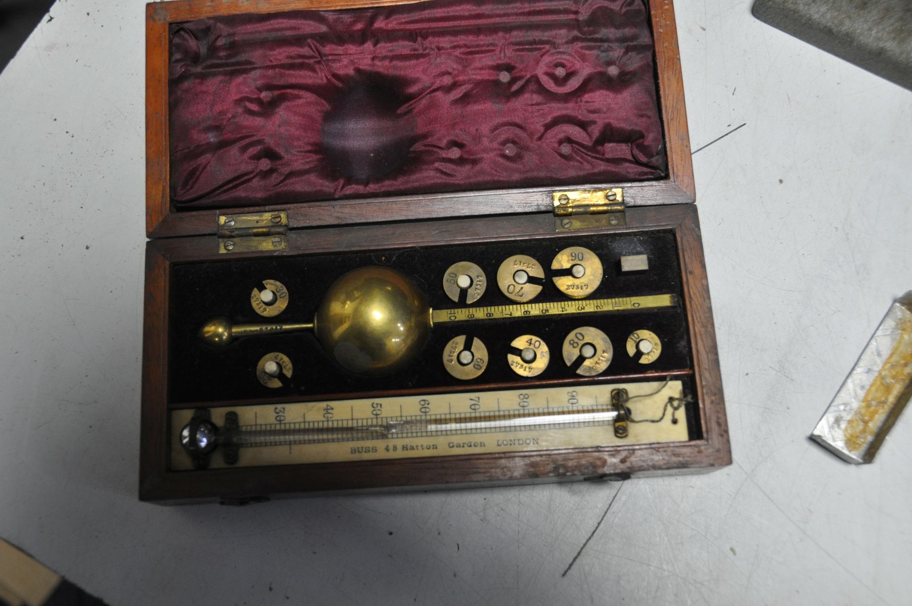 A SMALL TRAY CONTAINING ENGINEERING AND WATCHMAKERS TOOLS including two pin drivers, a Surface - Image 8 of 8