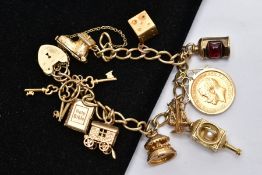 A 9CT GOLD CHARM BRACELET WITH HALF SOVEREIGN CHARM, curb link bracelet, each link stamped 9.375,