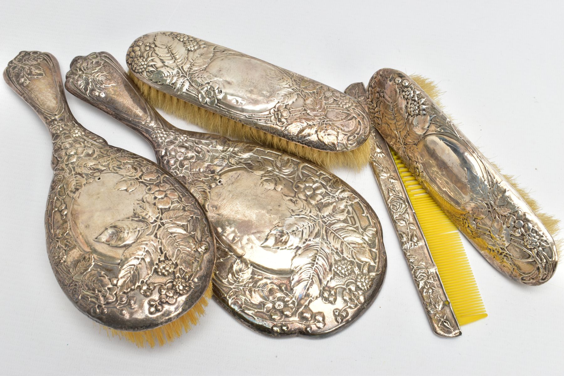 A FIVE PIECE SILVER VANITY SET, comprising of a hair brush, round hand held mirror, two clothes - Image 3 of 4