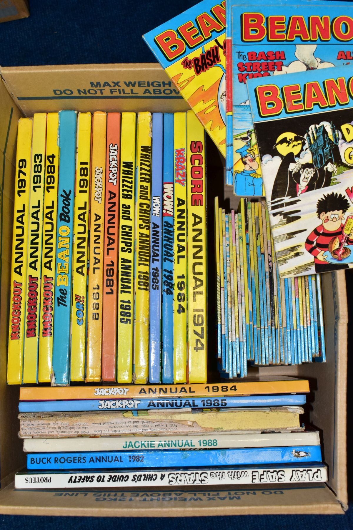 FOUR BOXES OF BOOKS, COMICS AND RECORDS, to include over forty 1970s and 1980s annuals, Blue - Image 4 of 4