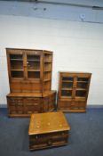 AN ERCOL GRASMERE ELM TWO DOOR BOOKCASE, width 101cm x depth 31cm x height 138cm, and a matching two