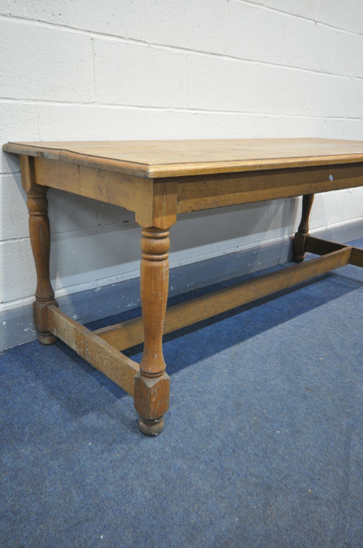 AN OAK REFECTORY TABLE, the plank top, on turned and block legs united by a cross stretcher, - Image 2 of 2