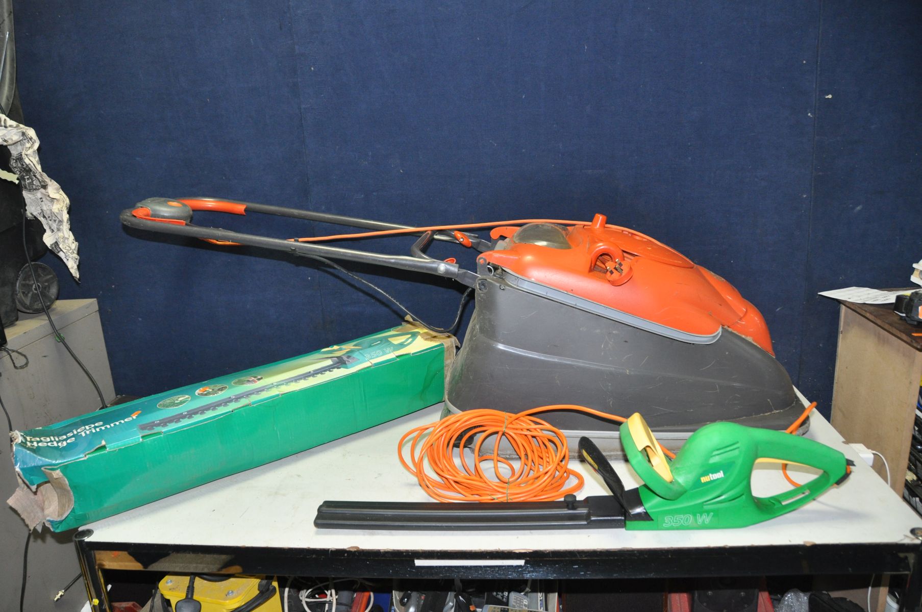 A FLYMO VISION COMPACT 380 LAWN MOWER and a NuTool Hedge Trimmer (both PAT pass and working)
