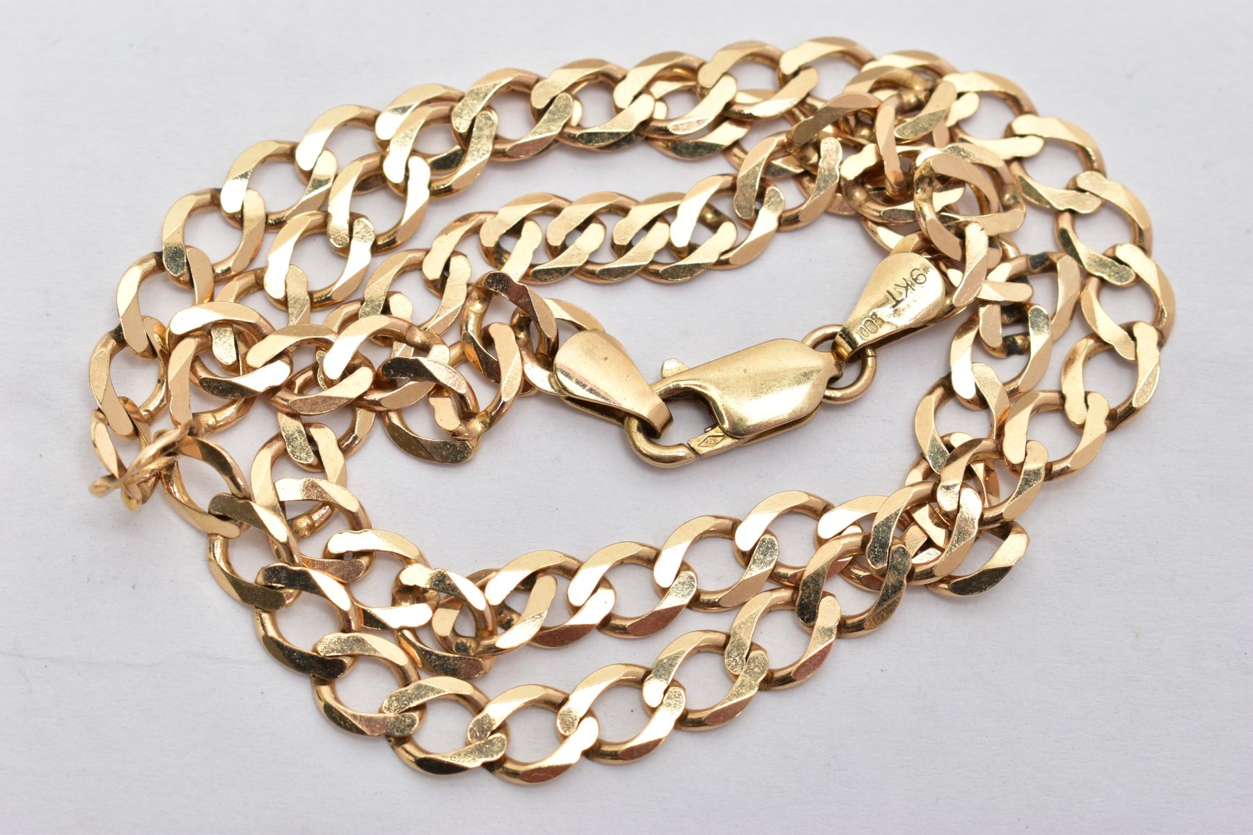A 9CT GOLD CHAIN NECKLACE, a flat curb link chain, approximate width 6mm, fitted with a lobster claw - Image 2 of 2