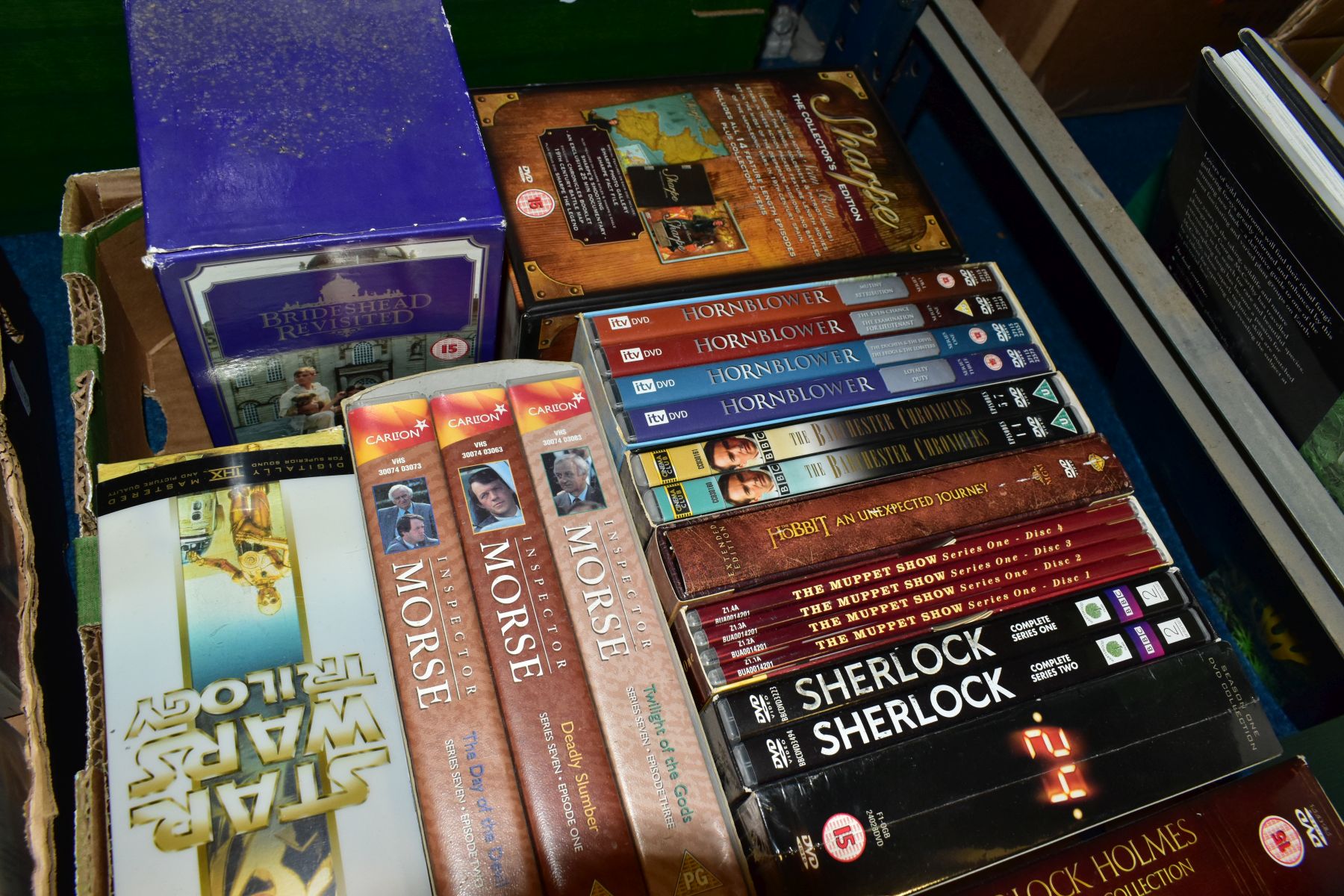 FIVE BOXES OF CERAMICS, DVDS, VHS CASETTES AND SHEET MUSIC, including a presentation tin Of Royal - Image 11 of 12