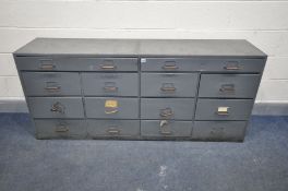A LOW METAL FILE CABINET with two long drawers above two banks of six drawers, width 176cm x depth