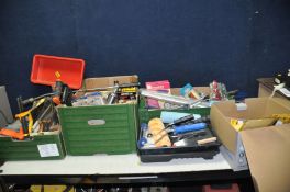 FOUR TRAYS CONTAINING HANDTOOLS AND ACCESSORIES including saws, sockets sets, a brace, a vice, etc