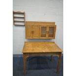 A PINE SIDE TABLE, width 110cm x depth 67cm x height 77cm, along with a pine four door cabinet,