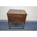 A VINTAGE LEOLA OAK CASED GRAMOPHONE, width including handle 78cm x depth 50cm x height 82cm (