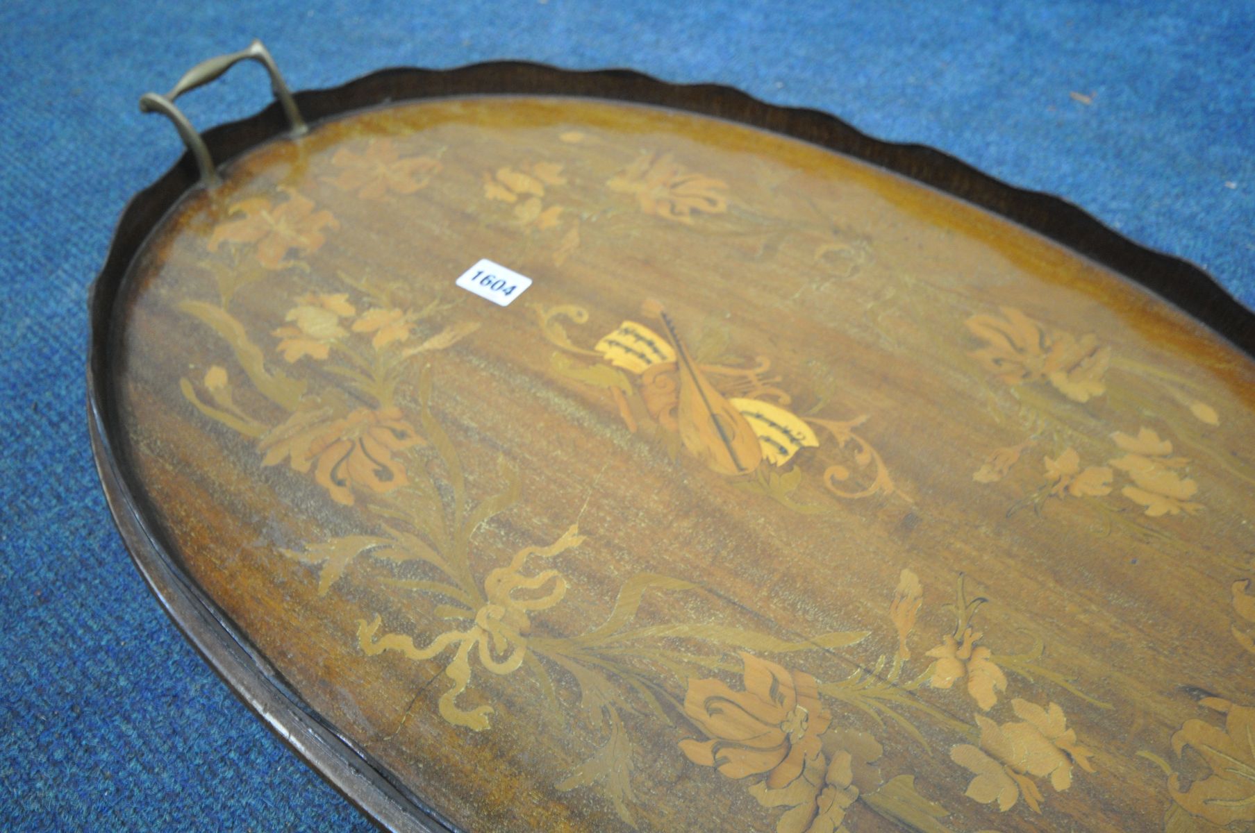 AN EDWARDIAN MAHOGANY AND MARQUETRY INLAID OVAL TRAY, with a wavy gallery and twin brass handles, - Image 2 of 2