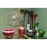 A GROUP OF COLOURED AND CLEAR GLASSWARE, including a table lamp, lacks electrical fittings, height