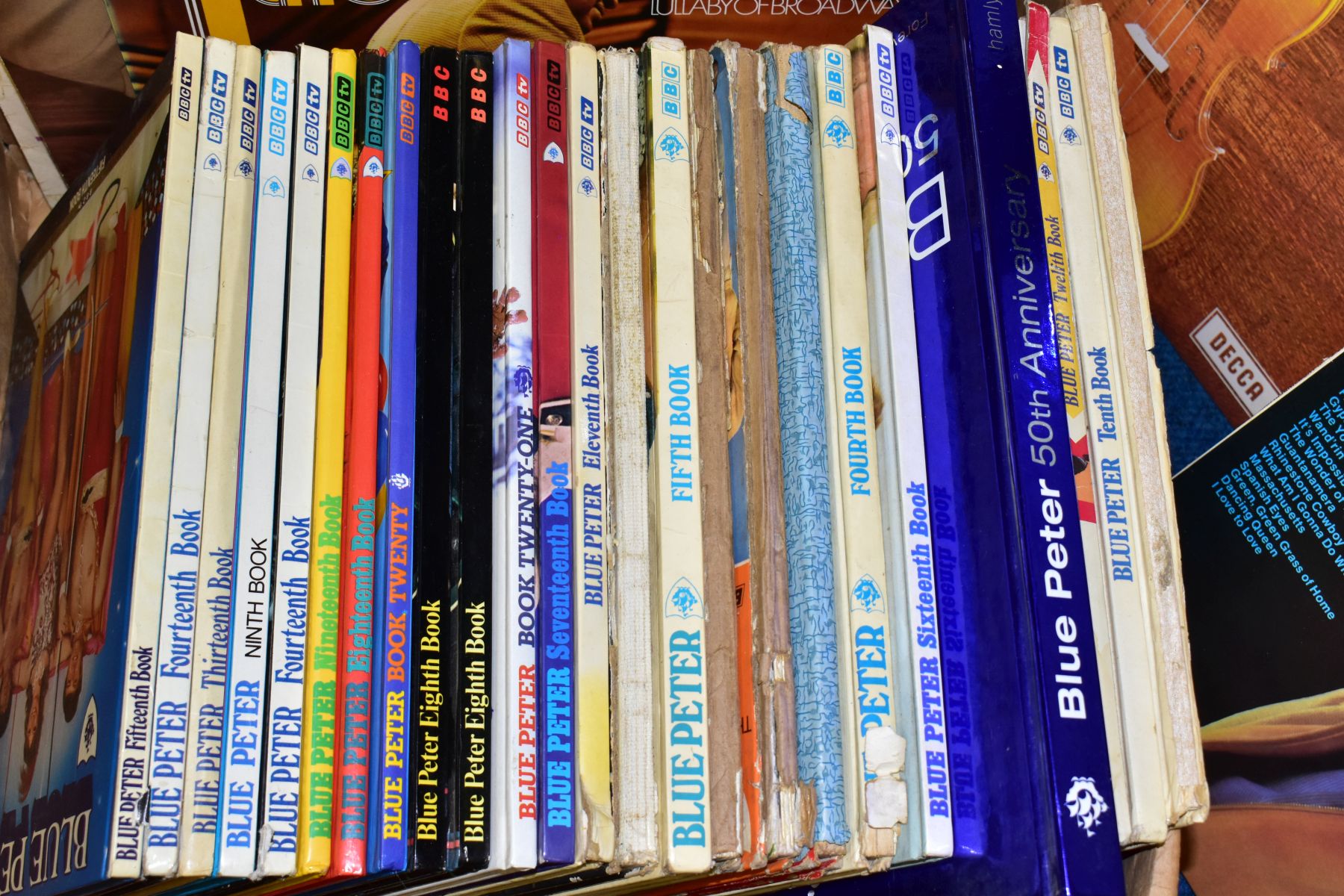 FOUR BOXES OF BOOKS, COMICS AND RECORDS, to include over forty 1970s and 1980s annuals, Blue - Image 3 of 4