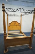 A MODERN PINE 4FT6 FULL TESTER BED FRAME (condition:-signs of wear and tear)