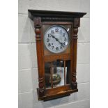 AN EARLY 20TH CENTURY OAK WALL CLOCK, height 73cm (winding key, pendulum, and service receipts