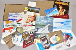 A BOX OF CONCORDE ITEMS, to include a copy of The Concorde Story by Christopher Orlebar, two