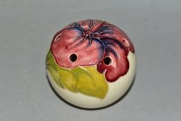 A MOORCROFT POTTERY POMANDER DECORATED WITH A PINK HIBISCUS ON A CREAM GROUND, tube lined date of