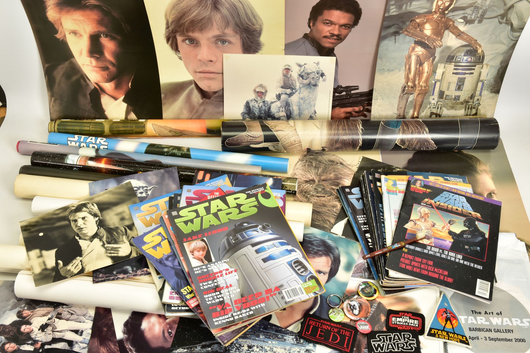A COLLECTION OF ASSORTED STAR WARS POSTERS AND MEMORABILIA, to include an original roll of 1970's