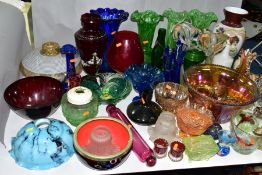 A QUANTITY OF COLOURED AND DECORATED GLASSWARES, to include a marigold carnival glass punch bowl