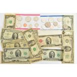 A PACKAGE CONSISTING OF 2X USA 1981 SEALED YEAR SETS, a quantity of USA banknotes of $30 value