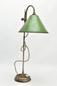 AN EARLY 20TH CENTURY INDUSTRIAL DESK LAMP, the height adjustable green enamel shade, on a shaped