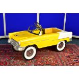 A YELLOW PEDAL CAR, modelled as a 1955 Chevrolet Bel Air convertible, unmarked, featuring a yellow