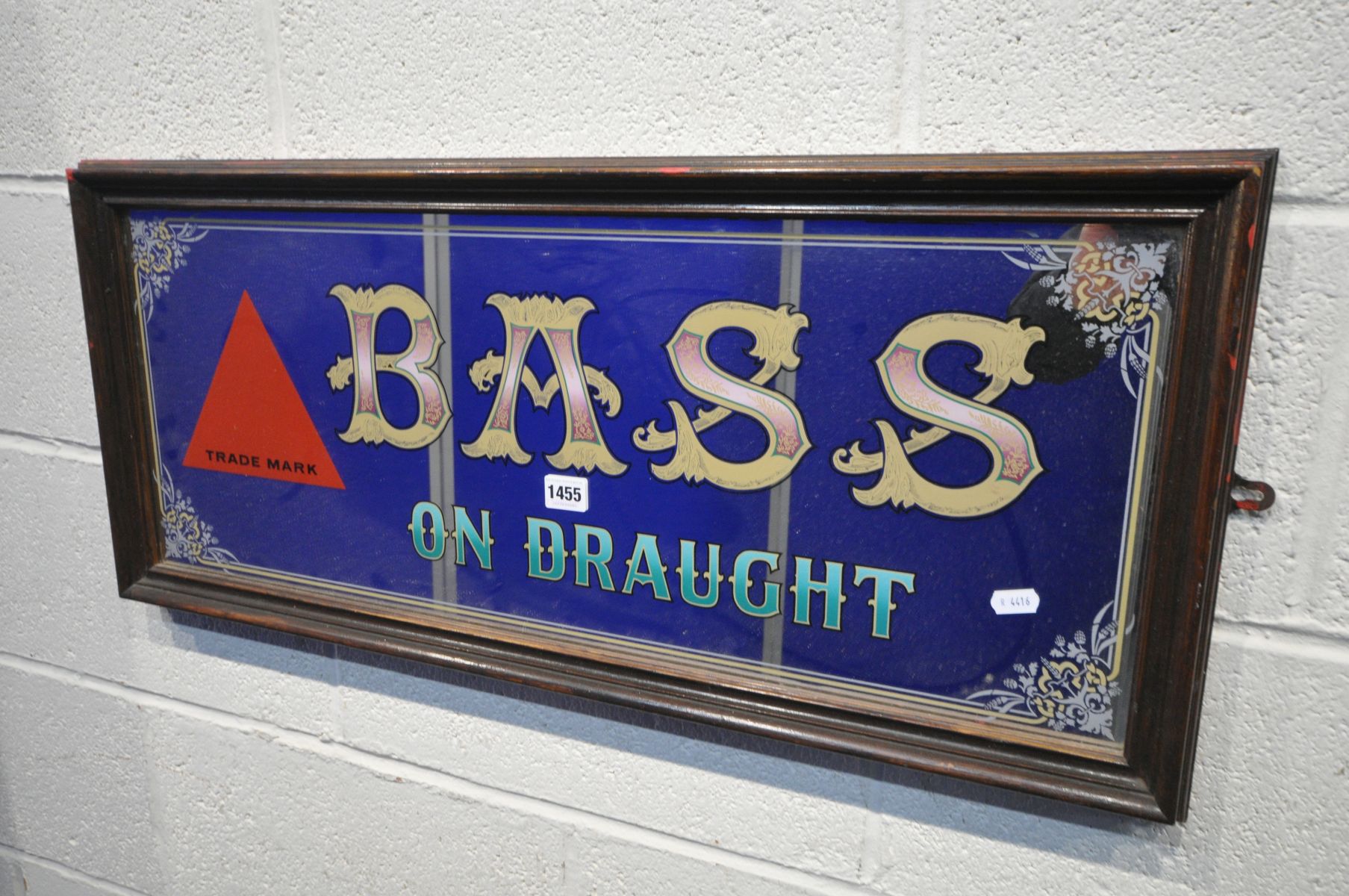 A BASS ADVERTISING MIRROR, length 82cm x height 37cm