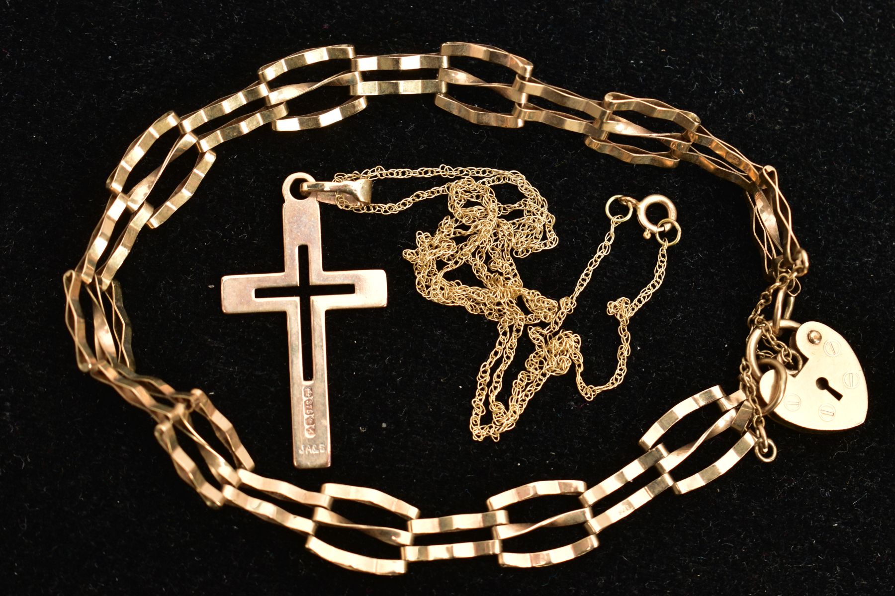 A 9CT GOLD GATE BRACELET AND A CROSS PENDANT NECKLACE, the gate bracelet designed with alternating - Image 2 of 2