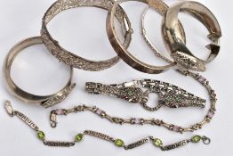 SIX BRACELETS AND A PAIR OF HOOP EARRINGS, to include a silver double jaguar head bracelet set