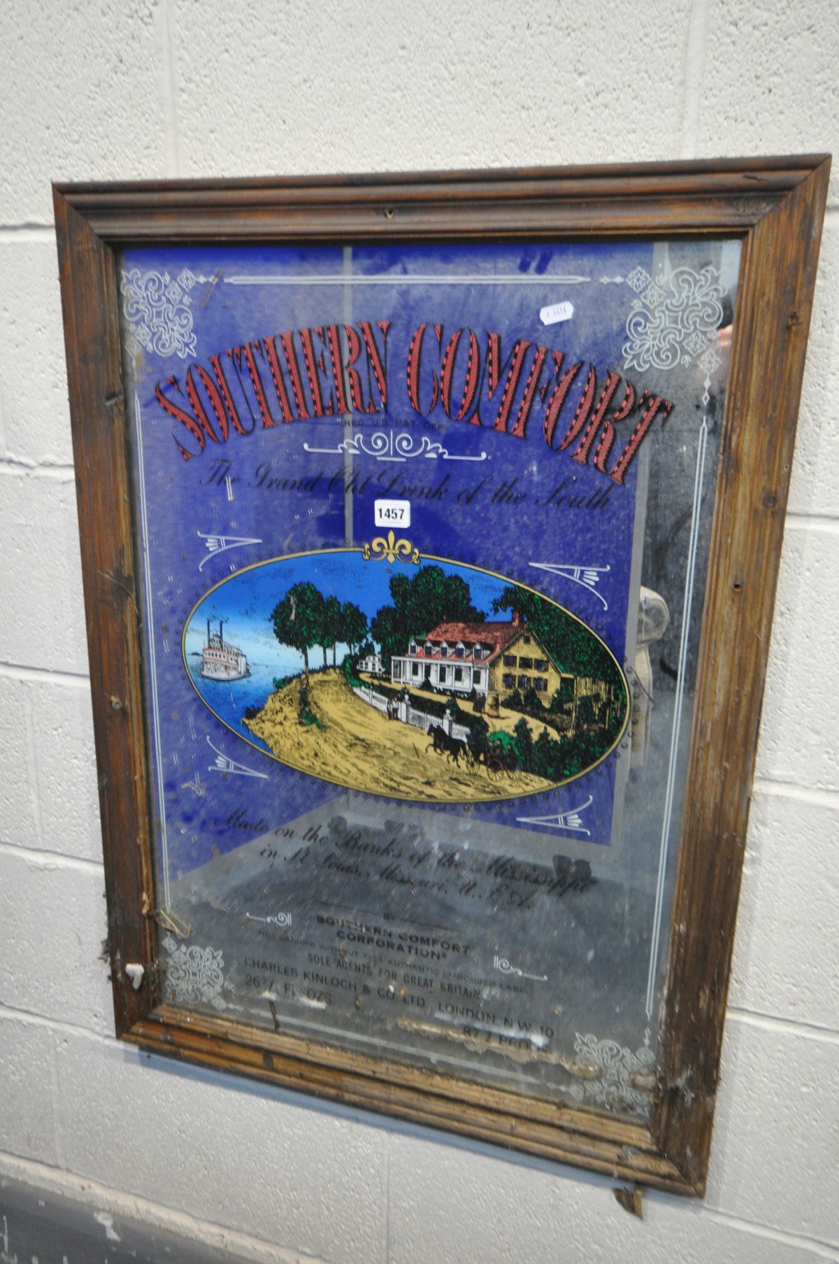 A SOUTHERN COMFORT ADVERTISING MIRROR, length 66cm x height 91cm (ideal for restoration)