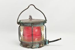 A NIPPON SENTO CO. LTD COPPER SHIPS RED LIGHT, with swing handle, clear glass outer casing, electric