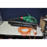 A BLACK AND DECKER GW250 GARDEN VAC/BLOWER with two spare pipes (PAT pass and working but switch