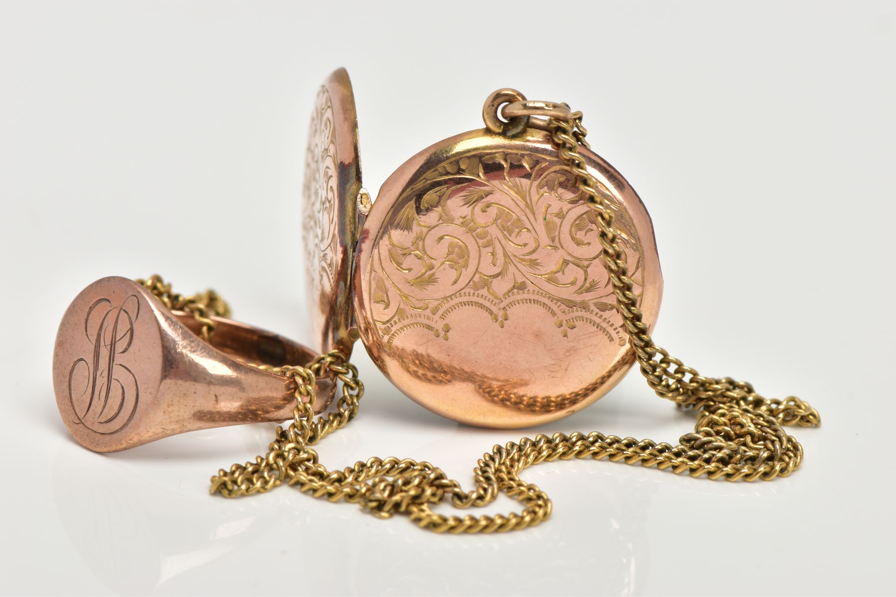 A 9CT GOLD SIGNET RING AND YELLOW METAL LOCKET, an oval shaped signet ring, engraved with the letter - Image 2 of 3