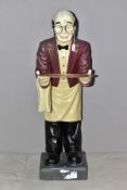 A RESIN BUTLER FIGURE, of a waiter holding an oval tray, height 95cm (condition:-some chips to