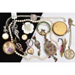 A BAG OF ASSORTED ITEMS, to include a large metal pendant set with rubies, quartz and colourless