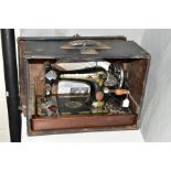 A SINGER K1831 No28 SEWING MACHINE, together with wooden case and reproduction instructions, very