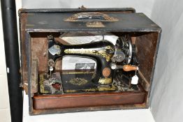 A SINGER K1831 No28 SEWING MACHINE, together with wooden case and reproduction instructions, very