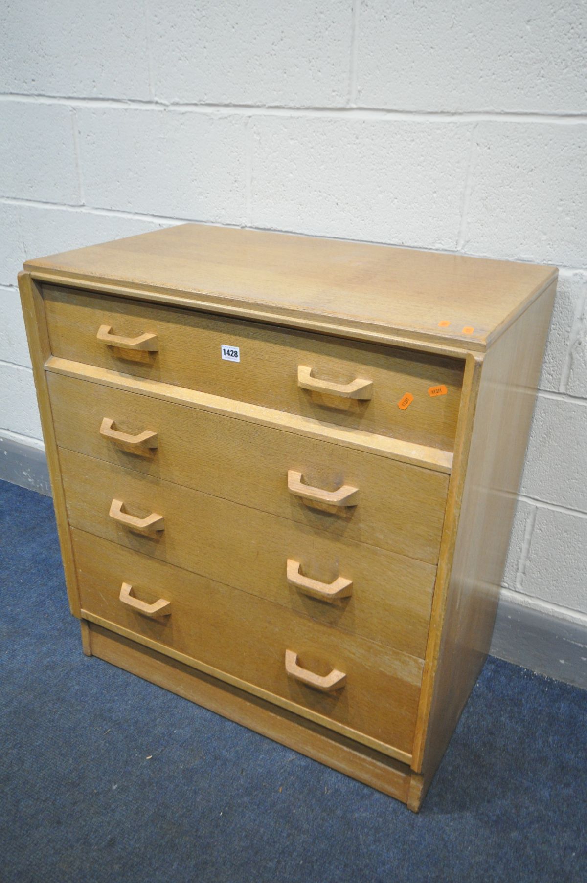 A G PLAN BRANDON OAK DESK/CHEST OF DRAWERS, the top serpentine drawer with a writing surface,