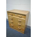 A G PLAN BRANDON OAK DESK/CHEST OF DRAWERS, the top serpentine drawer with a writing surface,