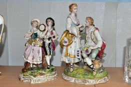TWO 20TH CENTURY CONTINENTAL PORCELAIN FIGURE GROUPS, comprising a group of lady and gentleman
